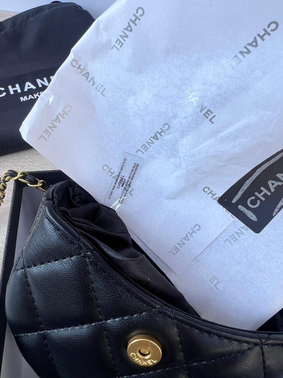 Black and gold pearl chain mini bag, full view with gift box