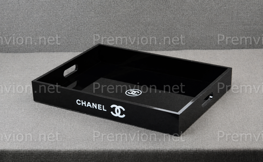 Elegant Chanel VIP gift black acrylic vanity organizer tray with glossy finish and side handles.