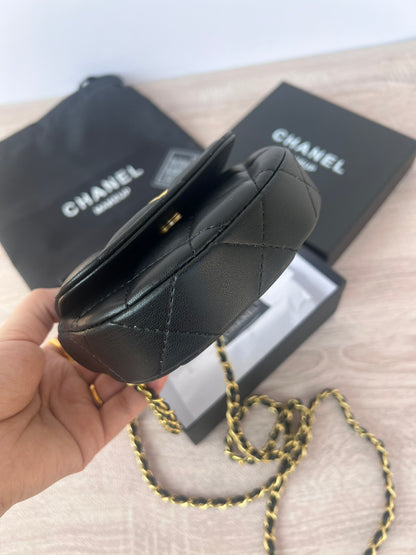 Mini vanity bag with pearl chain, close-up of pearl detailing