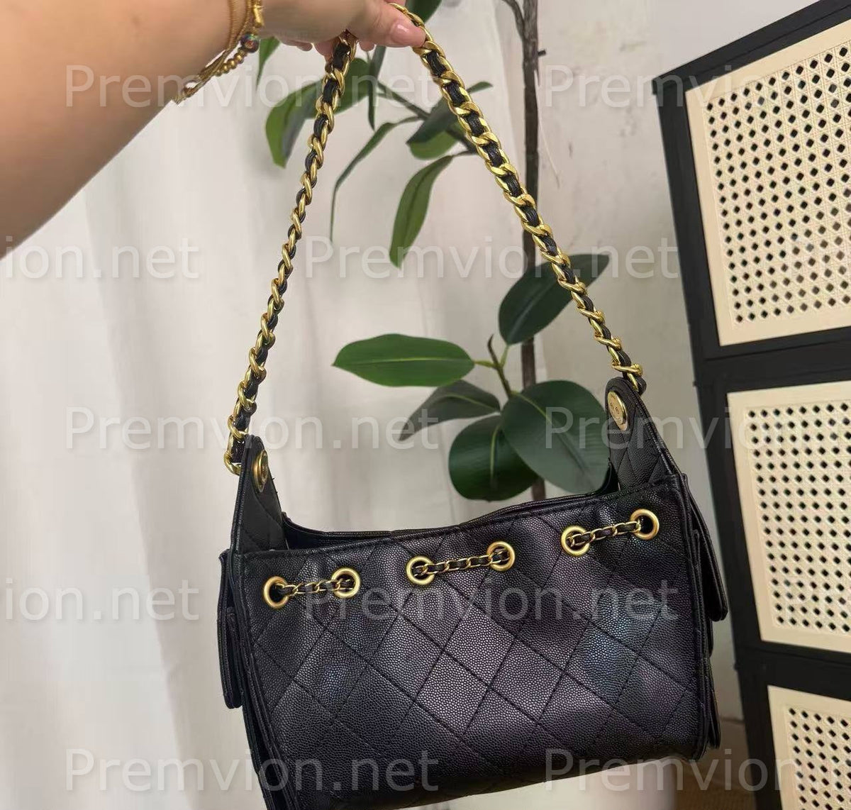 Black CHANEL leather cosmetic case for makeup and beauty essentials