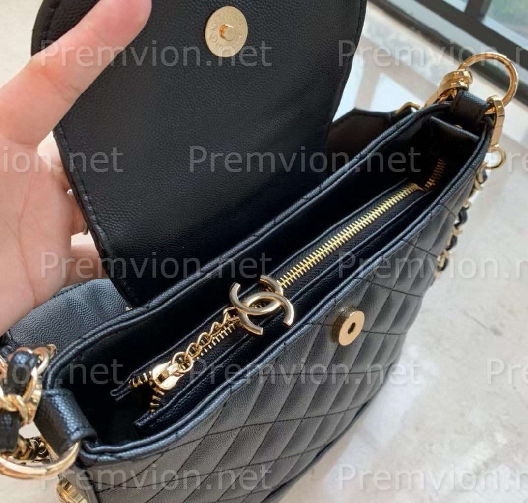 CHANEL Beauty promotional accessory with gold-tone branding