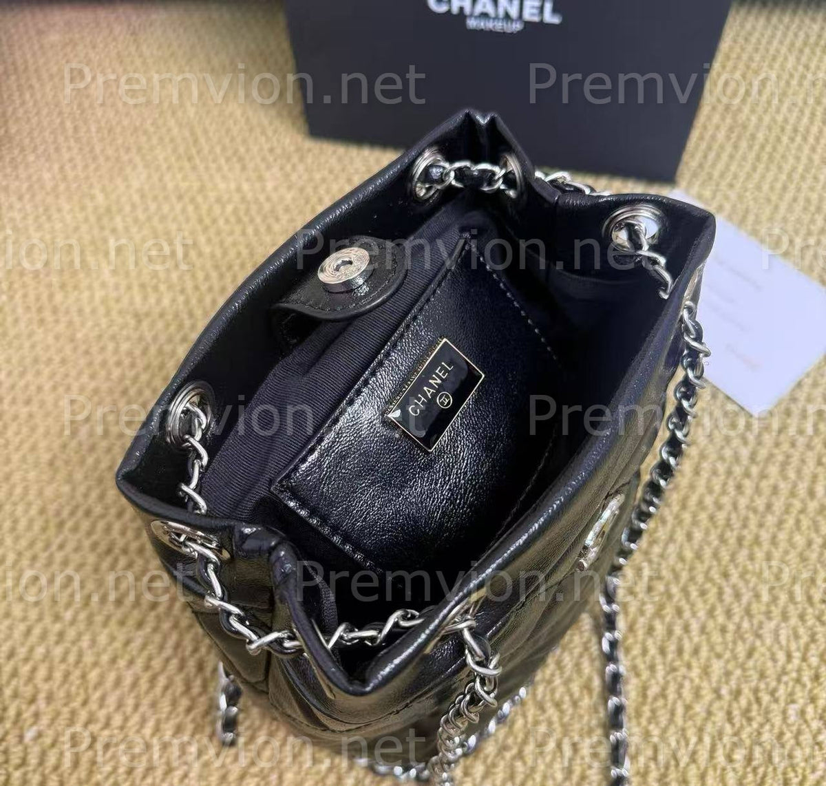 Unused Chanel leather beauty bag and promotional packaging