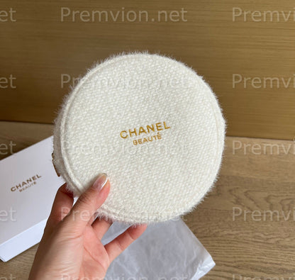 Chanel style tweed cosmetic bag for makeup storage