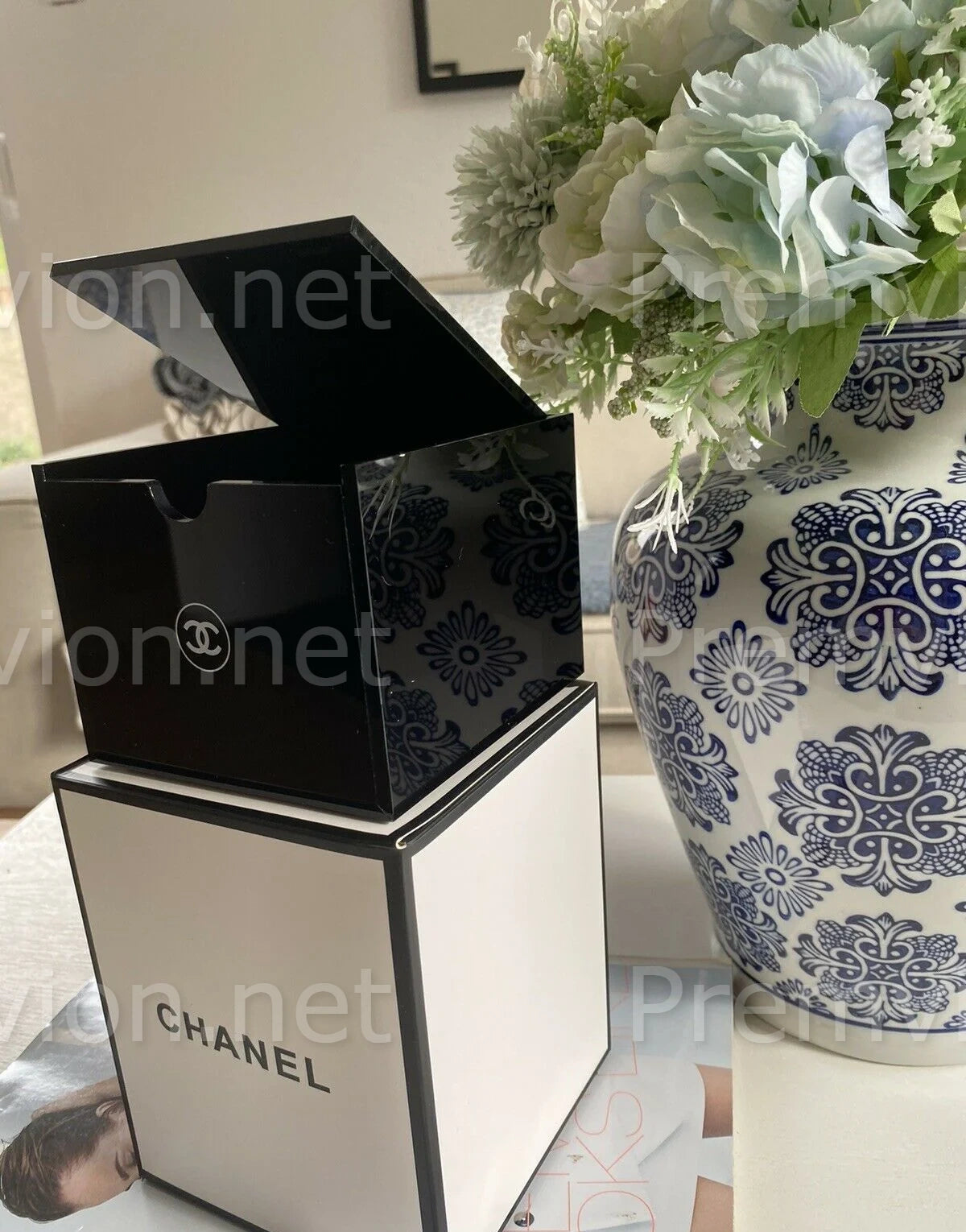 Elegant Chanel VIP gift cotton swab organizer for bathroom countertop and vanity.