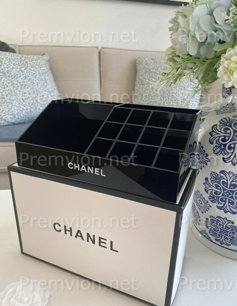 Chanel VIP gift black acrylic makeup organizer for luxury vanity storage.
