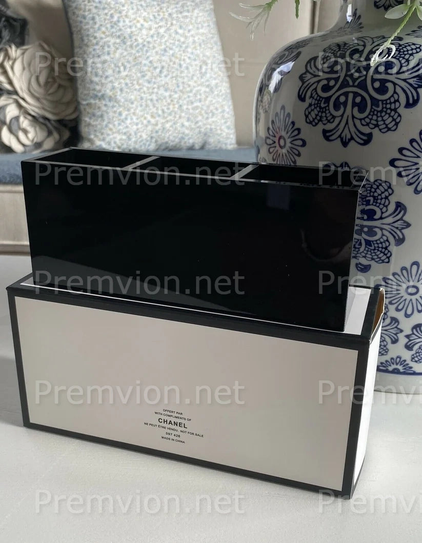 Premium Chanel acrylic vanity organizer with three compartments for luxury makeup storage and home décor.