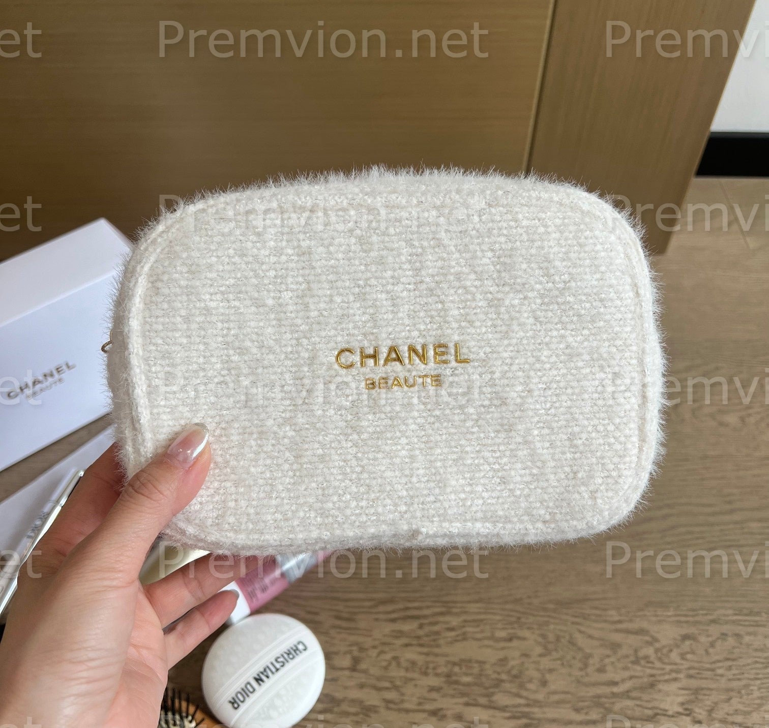 Chanel VIP makeup pouch made from tweed fabric