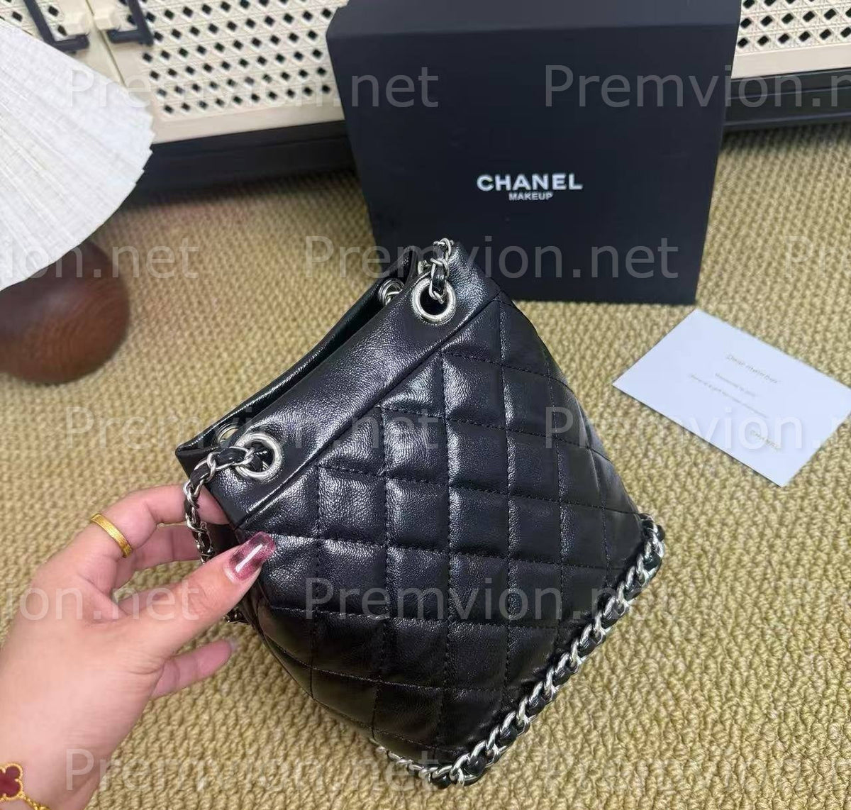 Black Chanel leather makeup bag with presentation box