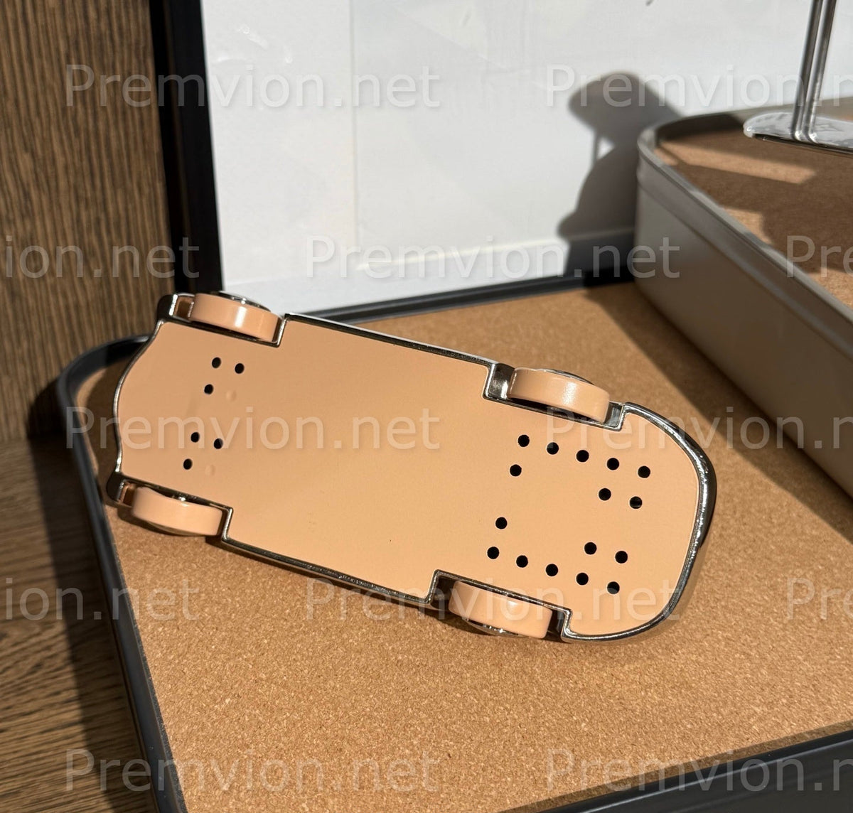 Silver Louis Vuitton Monogram car ornament for desk display