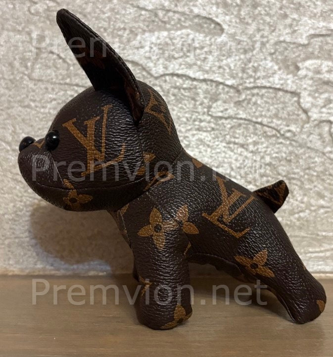 Handcrafted French Bulldog figure made from upcycled authentic Louis Vuitton leather.