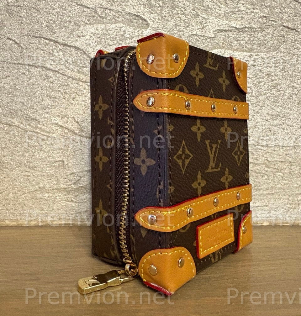 Premium Louis Vuitton leather key organizer featuring monogram pattern, durable zipper, and reinforced corners