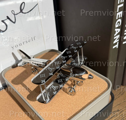 Louis Vuitton Monogram silver airplane collectible with propeller