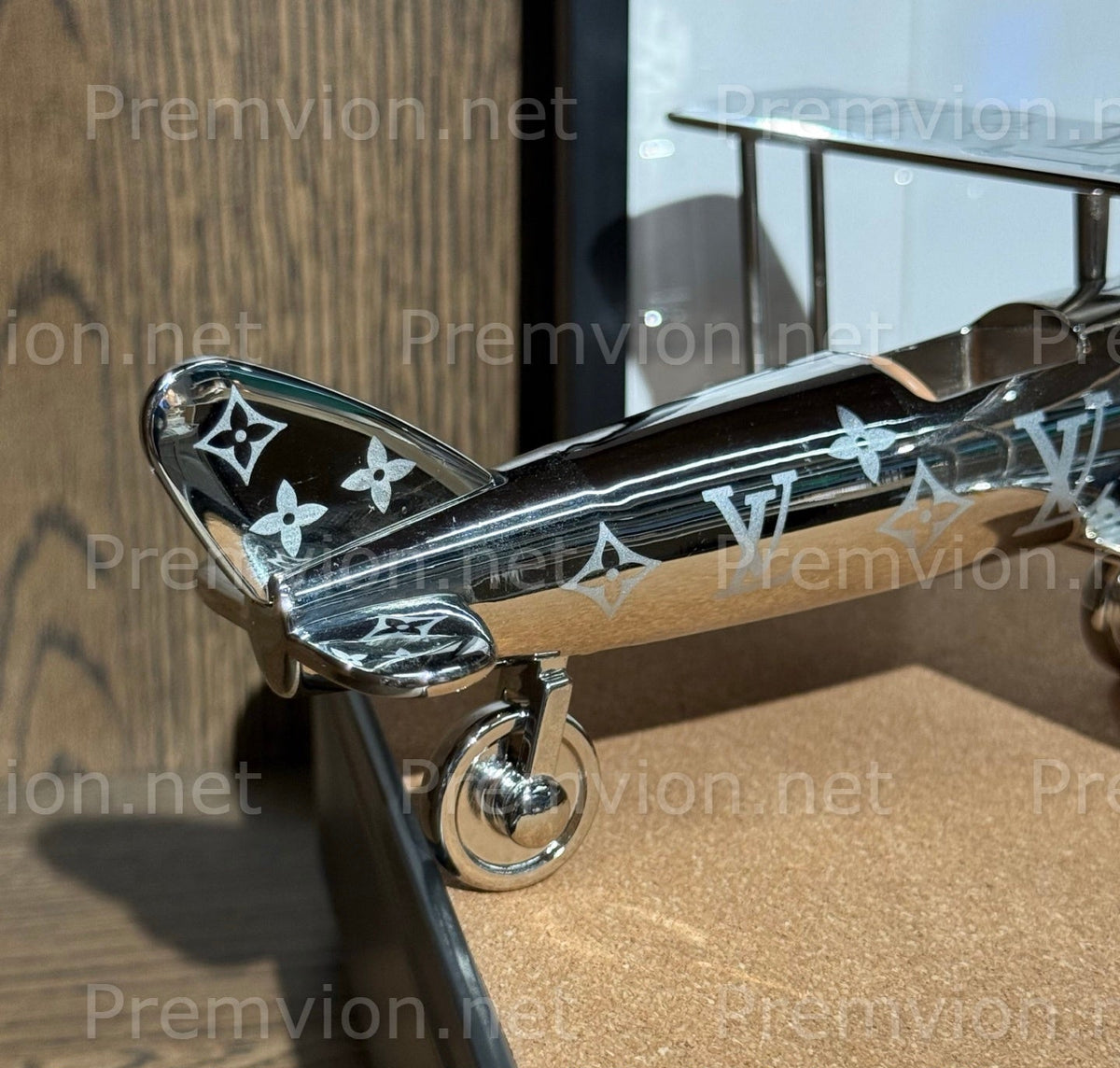 Louis Vuitton aviation collectible with Monogram patterned wings