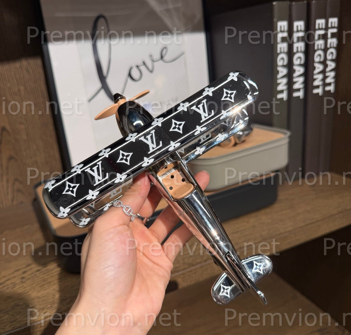 Louis Vuitton Monogram aircraft display object in polished metal