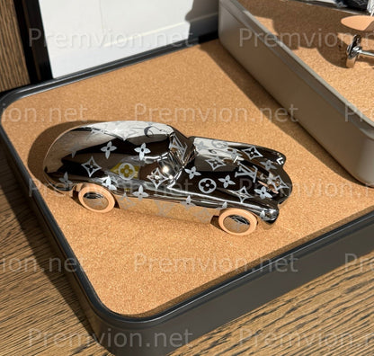 Louis Vuitton Monogram sports car paperweight in silver metal