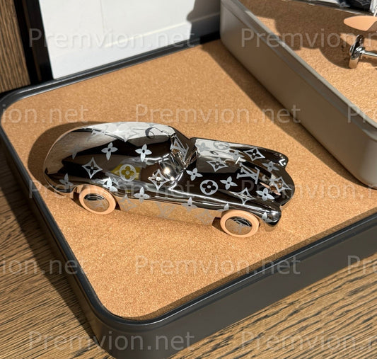 Louis Vuitton Monogram sports car paperweight in silver metal