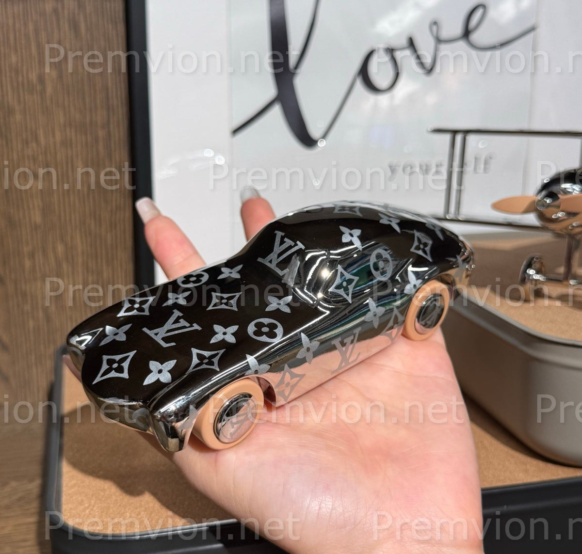 Authentic Louis Vuitton silver sports car collectible with Monogram detailing