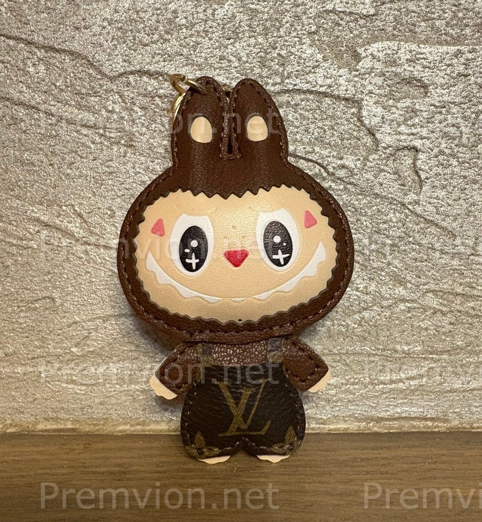 Louis Vuitton–style Labubu keychain featuring a monogram leather bunny character charm with stitched details, ideal for luxury bag decoration.