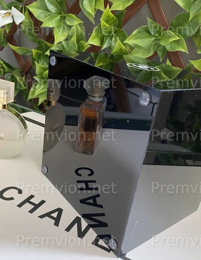 Luxury Chanel acrylic organizer for makeup brushes, lipsticks, and everyday beauty essentials.