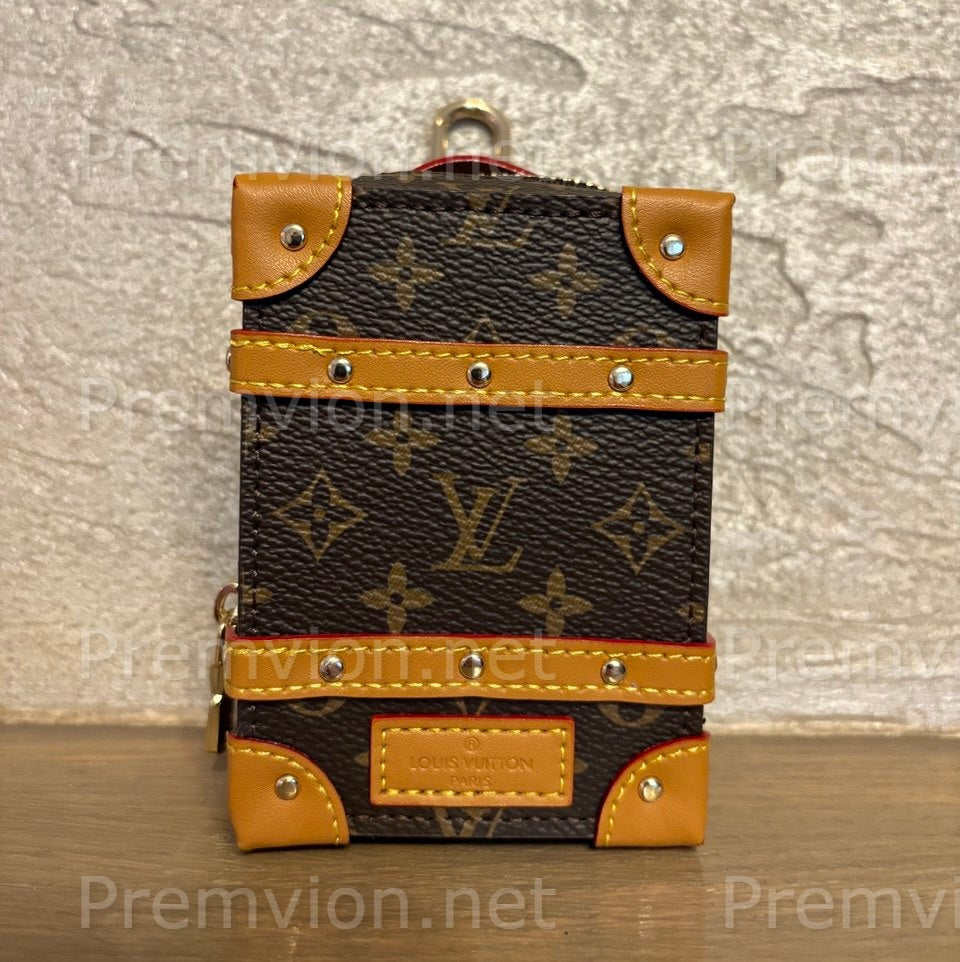 Compact LV leather key pouch ideal for keys, coins, and cards with a stylish luxury finish.