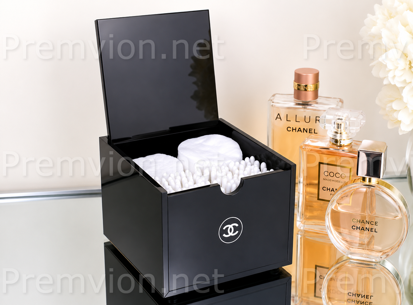 Chanel VIP gift acrylic cotton pad organizer with hinged lid for luxury vanity storage.