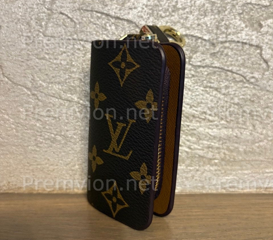 Louis Vuitton leather key holder, LV monogram keychain, luxury leather key clip, designer key case, LV leather accessory, premium key holder, unisex leather keychain