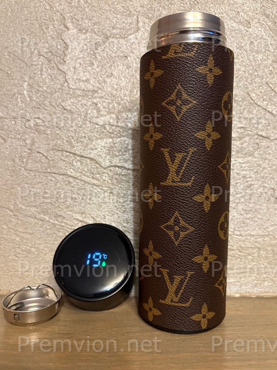 Elegant Louis Vuitton leather–style insulated travel mug with smart temperature display, perfect as a luxury gift item.