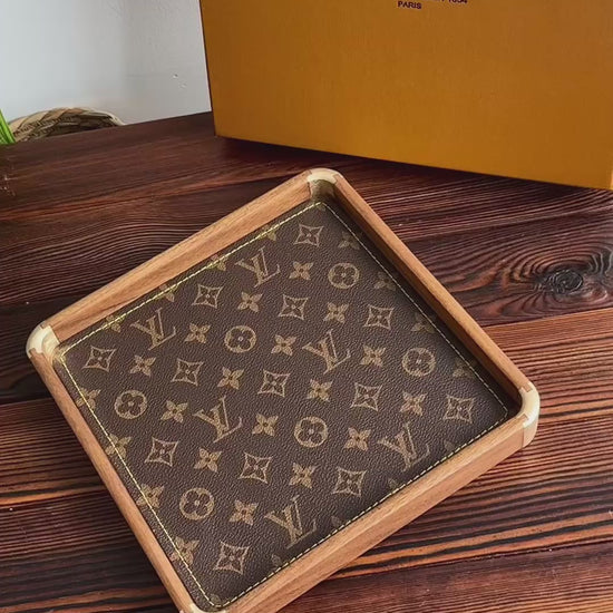 Sophisticated Louis Vuitton style walnut tray as elegant home decor accent