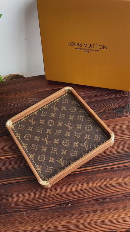 Sophisticated Louis Vuitton style walnut tray as elegant home decor accent