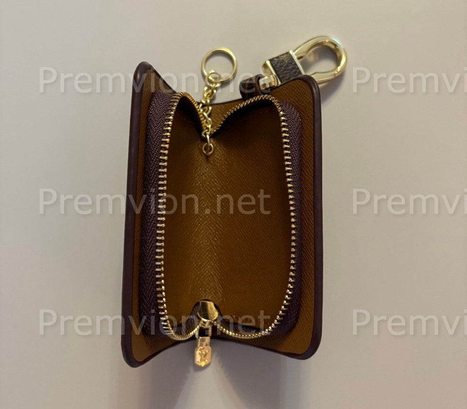 Slim Louis Vuitton leather key holder ideal for keys, bags, and minimalist carry